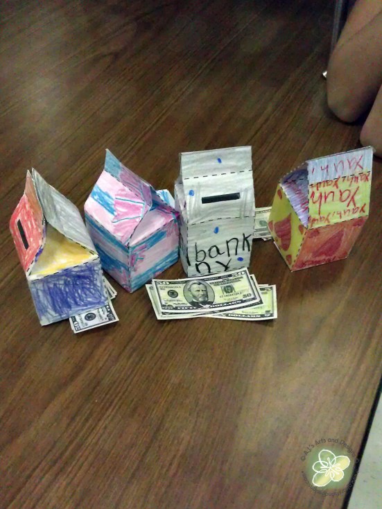 My troops milk carton banks and their fake money.