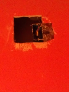 Giant hole to install an outlet box.