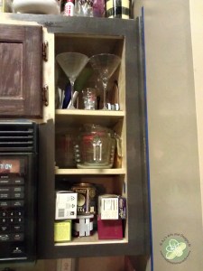 I started with taking one door off. I only took one door off because taking doors off is a HUGE pain. I painted around the others.