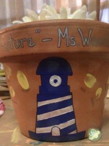Teacher's Gift - this year it was a Terra Cotta Pot with the school logo and the kids finger prints as the rays of light from the lighthouse.  Due to the Tropical Storm the flowers were not from the garden, we made flower pens.